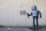 Painter and movie director, Banksy is an antisystem urban artist