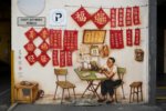 SINGAPORE: Painted walls and graffiti street art Mural entitled 'Letter Writter' painted by Yipyewchong in China